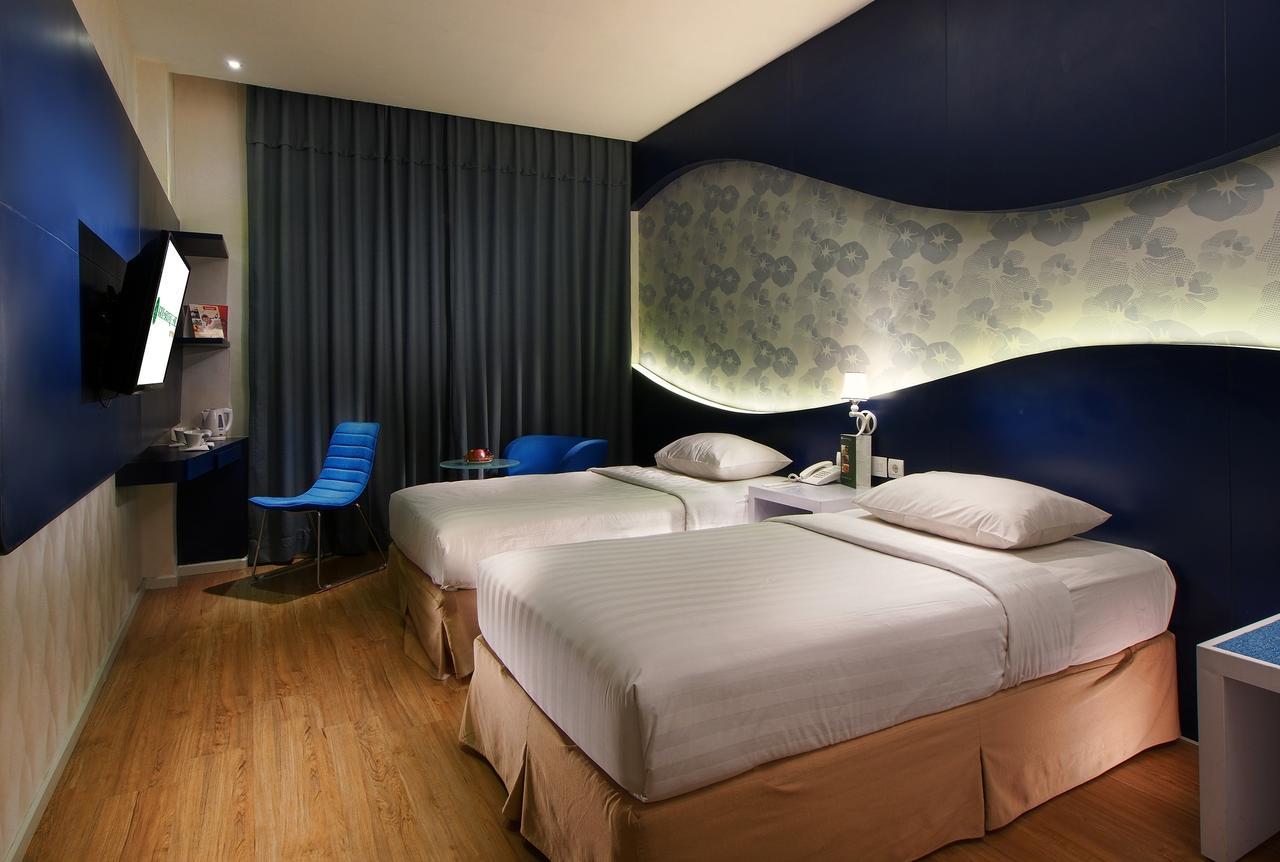 Karibia Boutique Hotel Medan Habitación foto